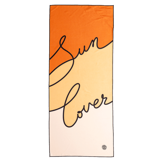 The Summer Chaser sustainable travel towel for beach, pool and yoga. Flat top view of Sun Lover design in burnt orange and sand colour.